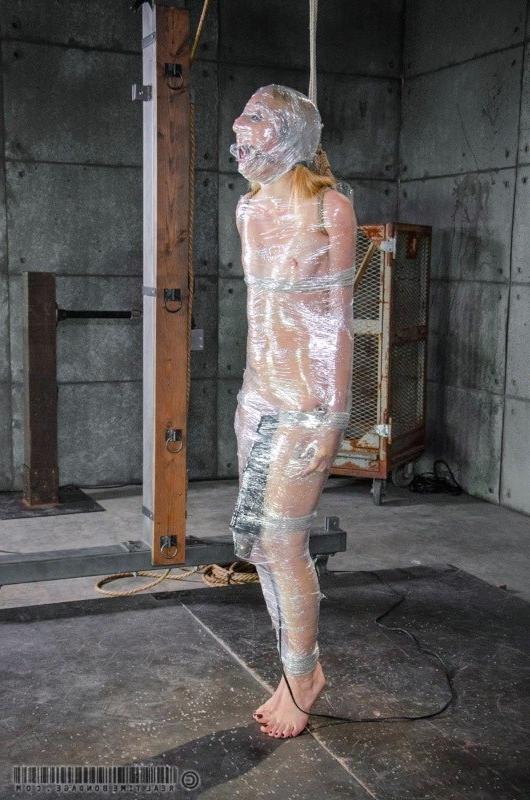 16P Emma Haize is wrapped in seethru plastic and toyed