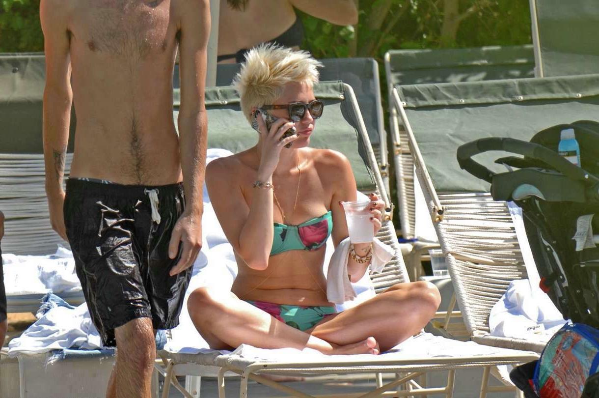 16P Miley Cyrus exposes her nude topless breasts for mag 