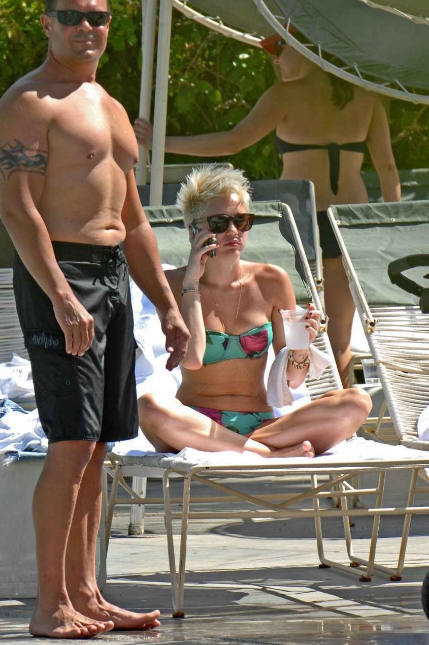 16P Miley Cyrus exposes her nude topless breasts for mag 