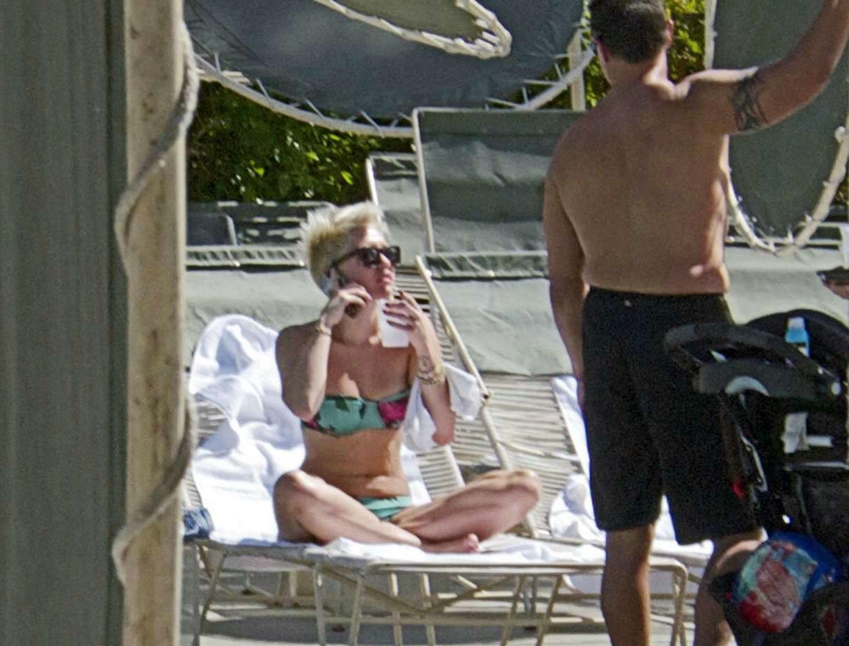 16P Miley Cyrus exposes her nude topless breasts for mag 