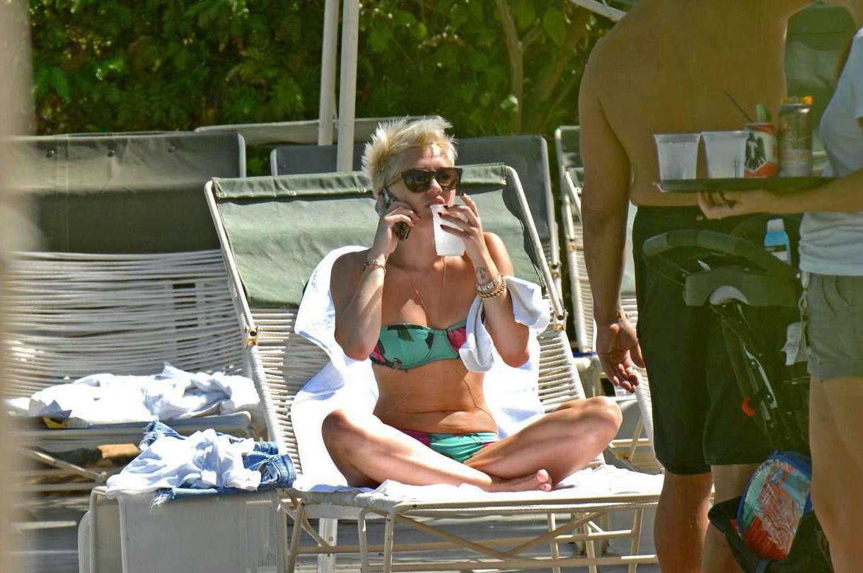 16P Miley Cyrus exposes her nude topless breasts for mag 