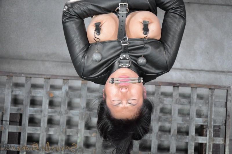 16P Mia Li is bound in straight jacket and made to suck a big cock