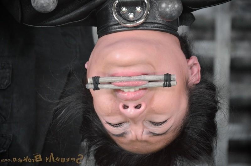 16P Mia Li is bound in straight jacket and made to suck a big cock