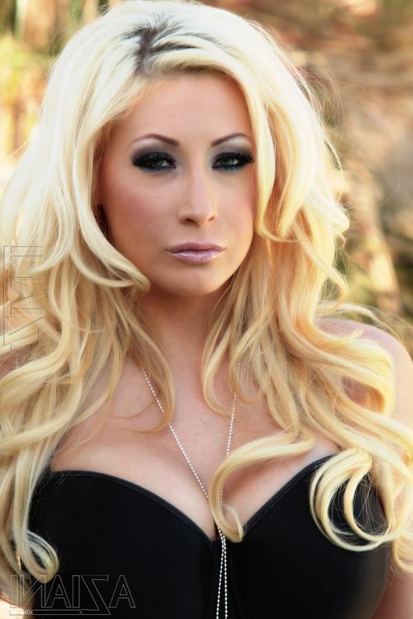 15P Beautiful blonde locks, huge perfect tits, and a sexy out dorr striptease.  Cand