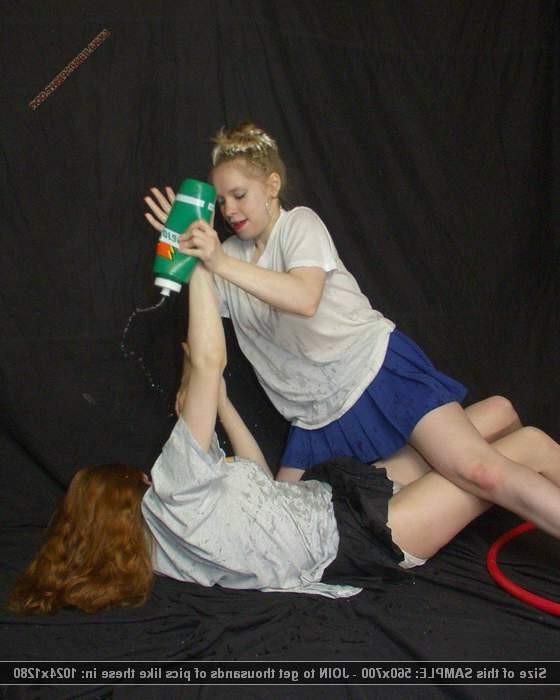 12P Bitchfight turns into wet t-shirt catfight
