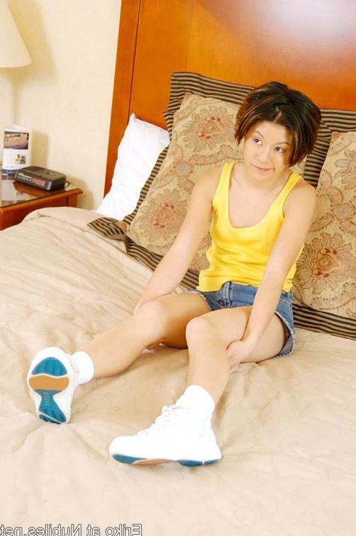 9P Cute petite teen shoves dildo way deep