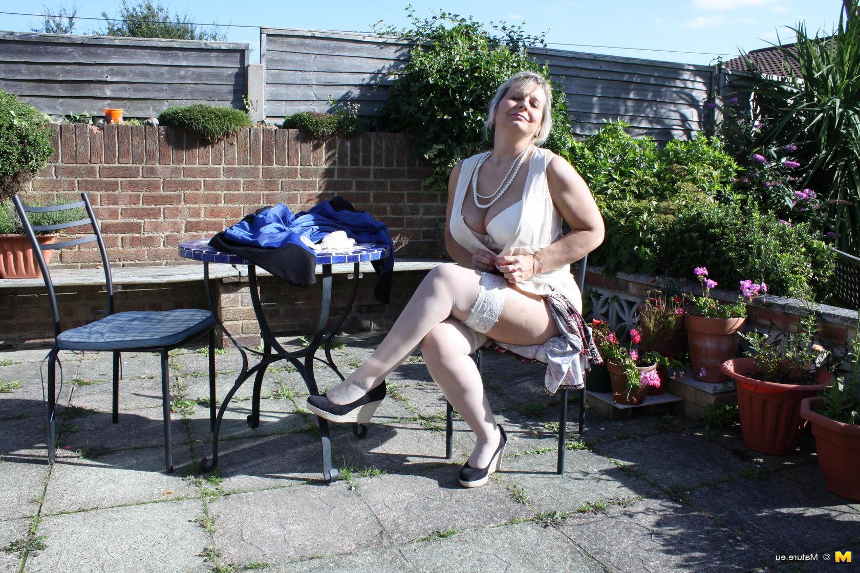 16P Horny mature lady strips in her garden