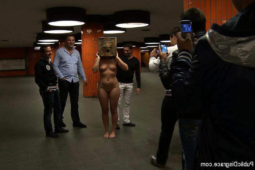 15P Beautiful blonde is left with her head locked in a box in a subway station. Boun