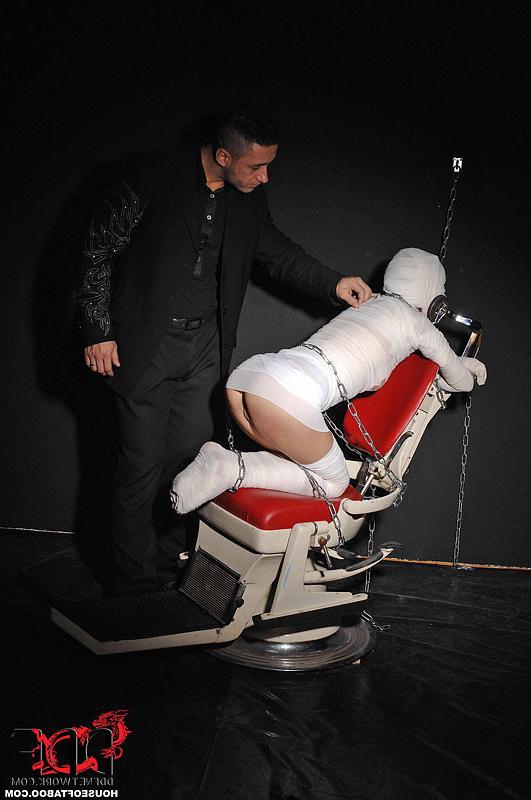 16P Leyla Black is mummified and spanked pussy exposed