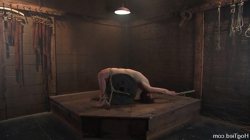 15P Redhead with gag in mouth hole bondaged and fucked with device