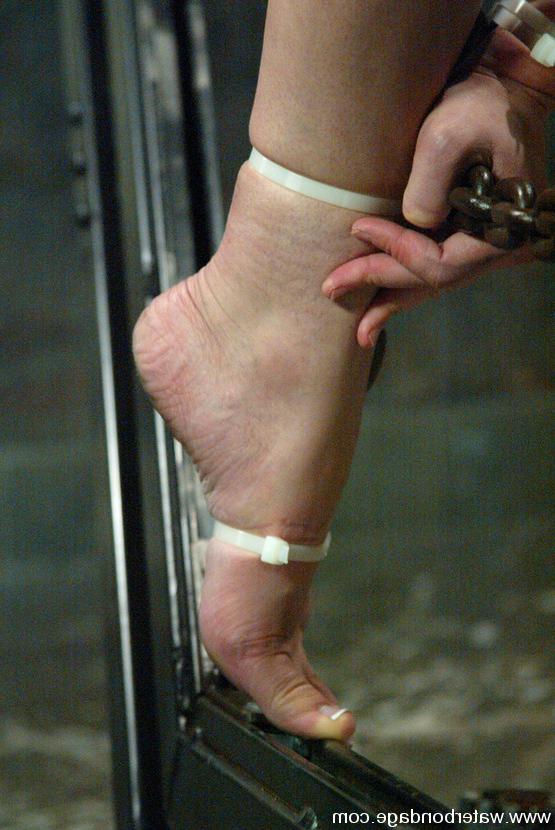 15P Petite Amber Rayne is suspended upside-down and dunked