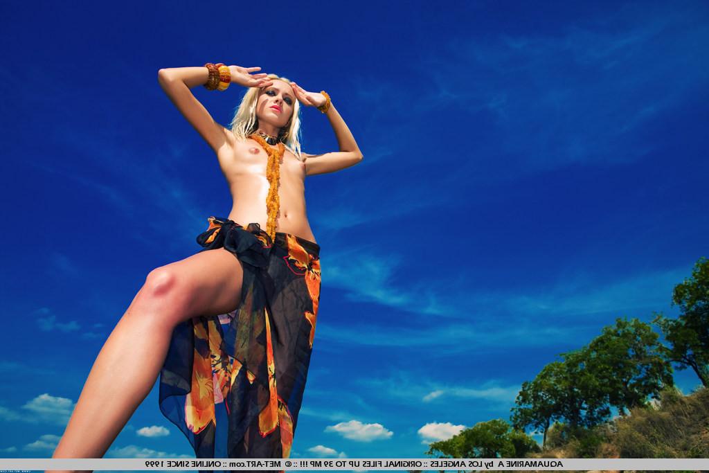 19P petite blonde poses at the beach