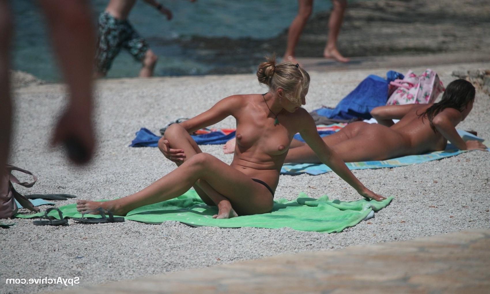 4P Beautiful blonde teen gets caught on voyeurs camera