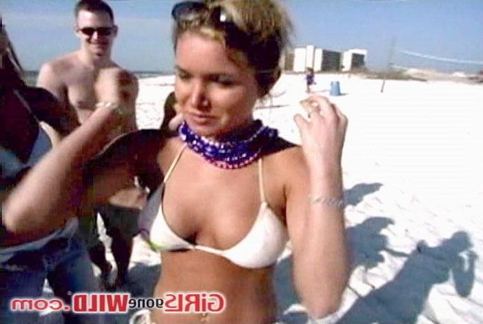 10P Cutie at the beach shows us her perky tits