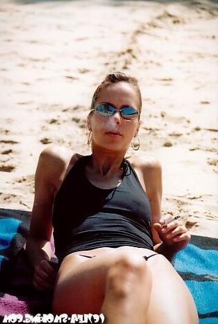 16P Teen smoking at the beach