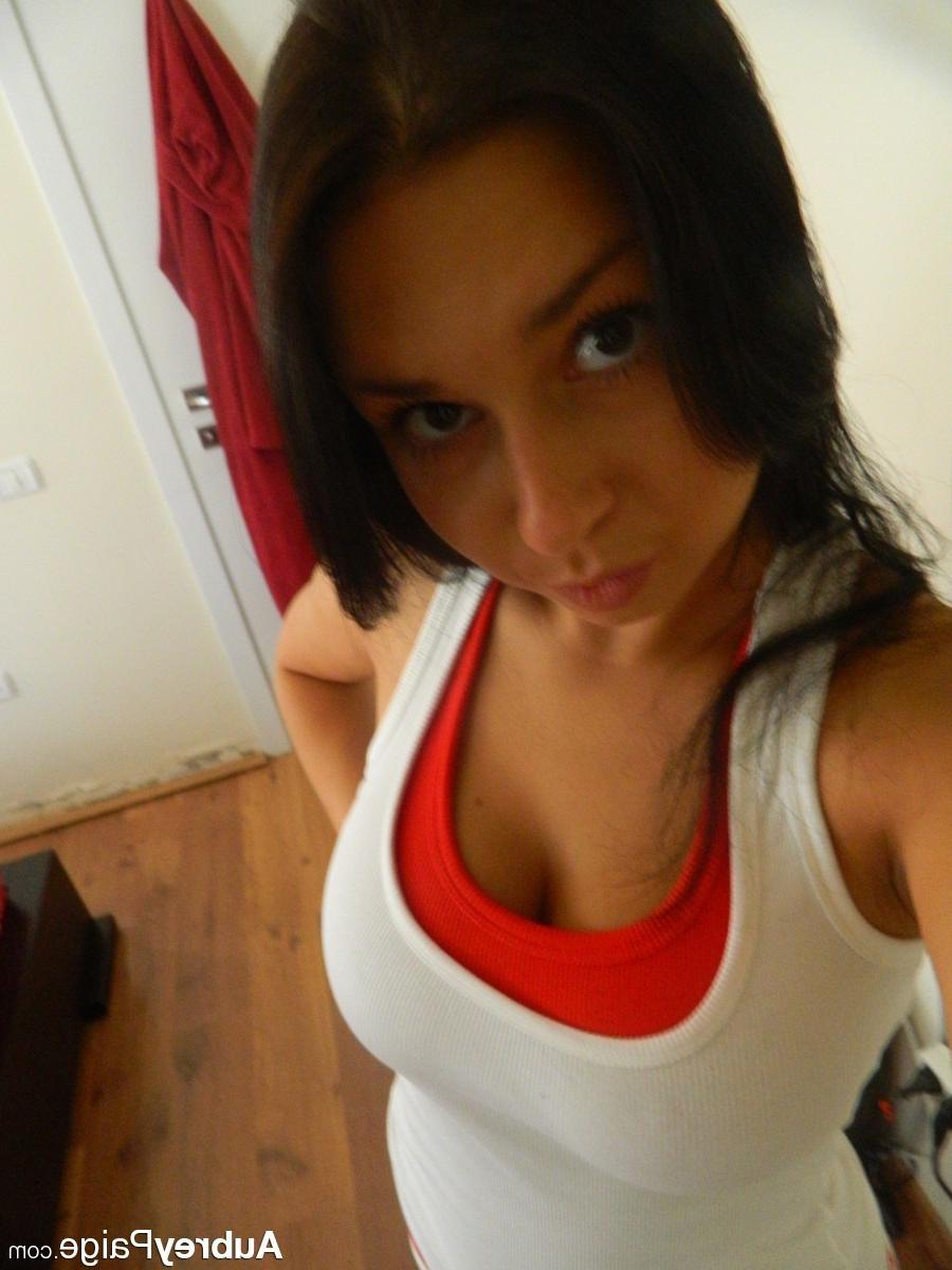 12P Gorgeous busty babe having fun with a phone