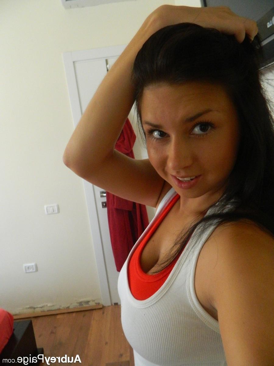 12P Gorgeous busty babe having fun with a phone