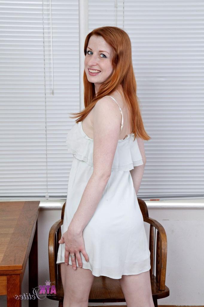 15P Horny coed Kira Lake gets naked and proudly spreads her shaved snatch