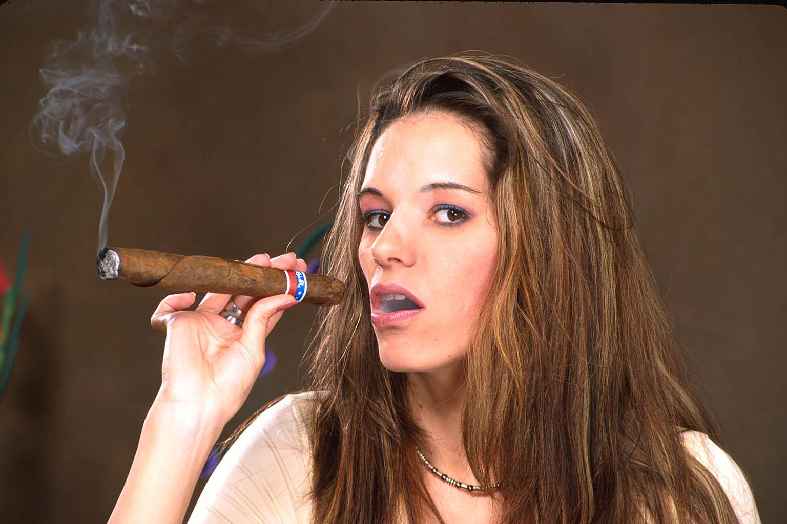 16P Hairy pussy babe in blue lacy panties smoking a big cigar