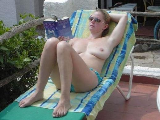 18P Sexy blonde flaunts huge tits on the beach