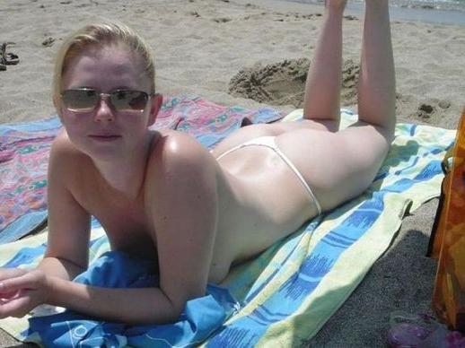 18P Sexy blonde flaunts huge tits on the beach