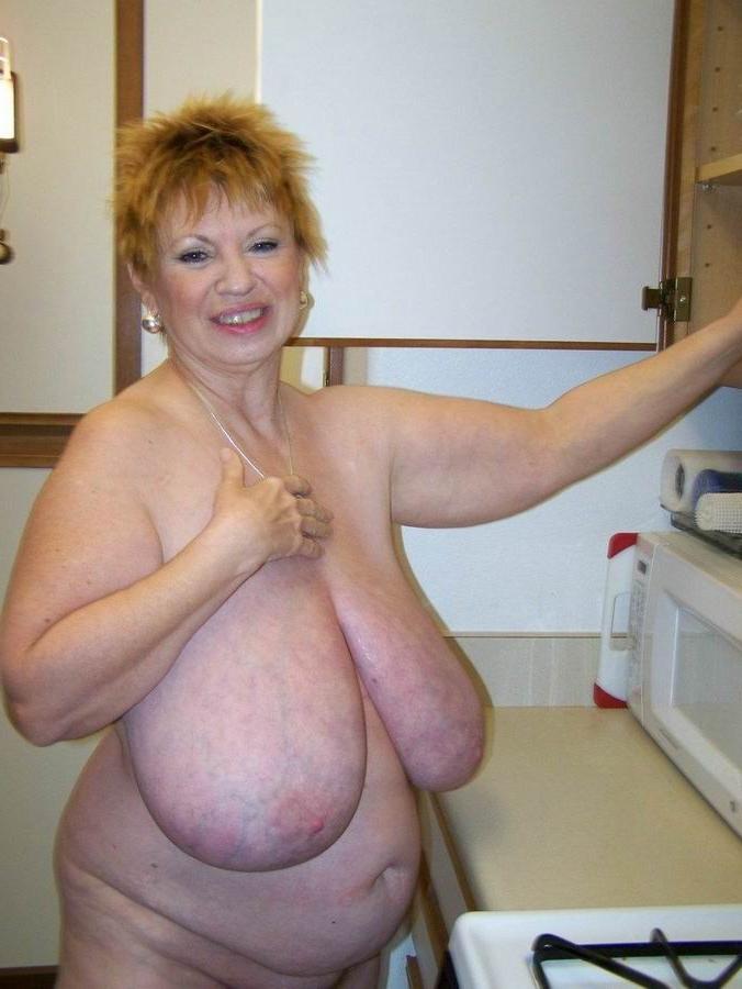 16P Mature with huge boobs poser