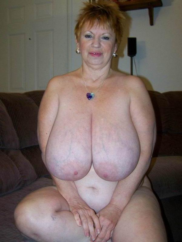 16P Mature with huge boobs poser