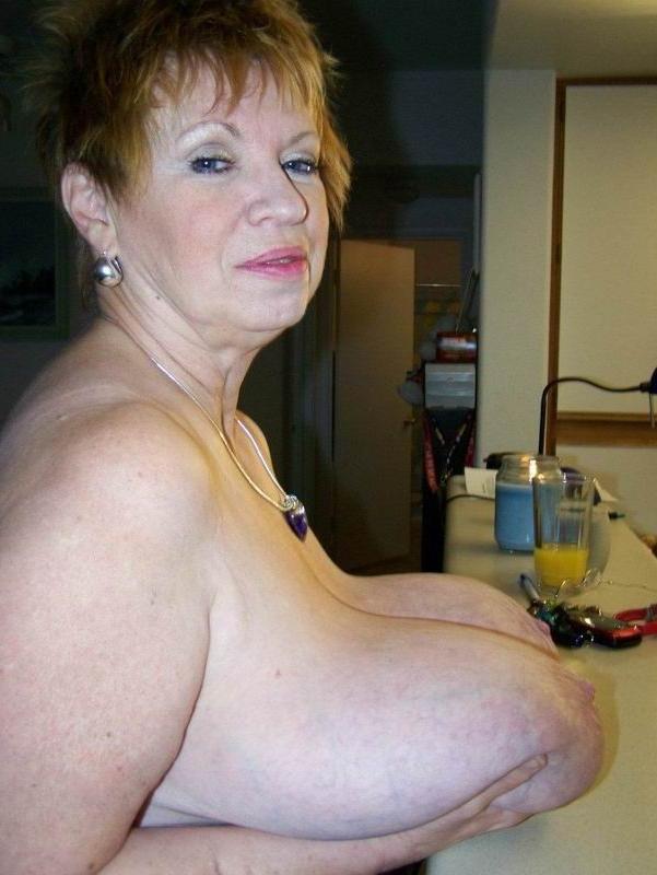 16P Mature with huge boobs poser