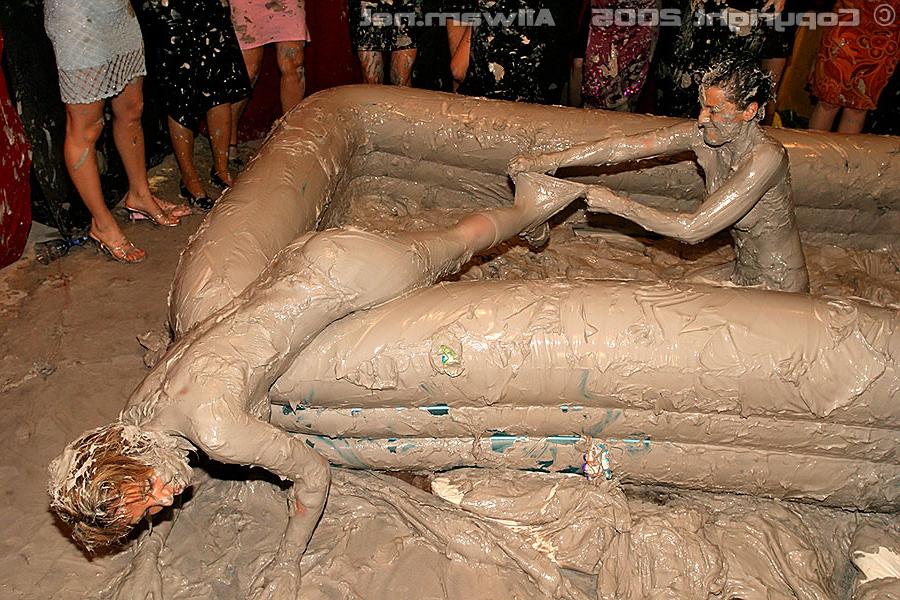 15P Crazy hot and wild babes getting muddy wrestling in pool