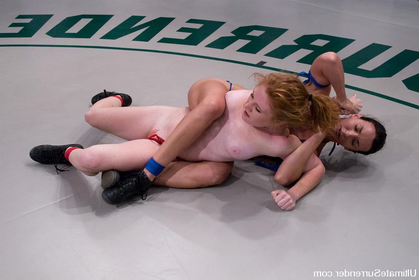 15P Sexy red head get assed kicked in nude wresting.