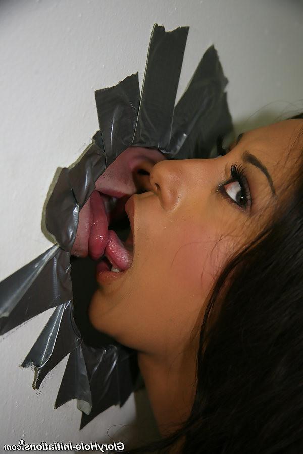 18P Big Titted London Reigns sucking off two cocks at gloryhole