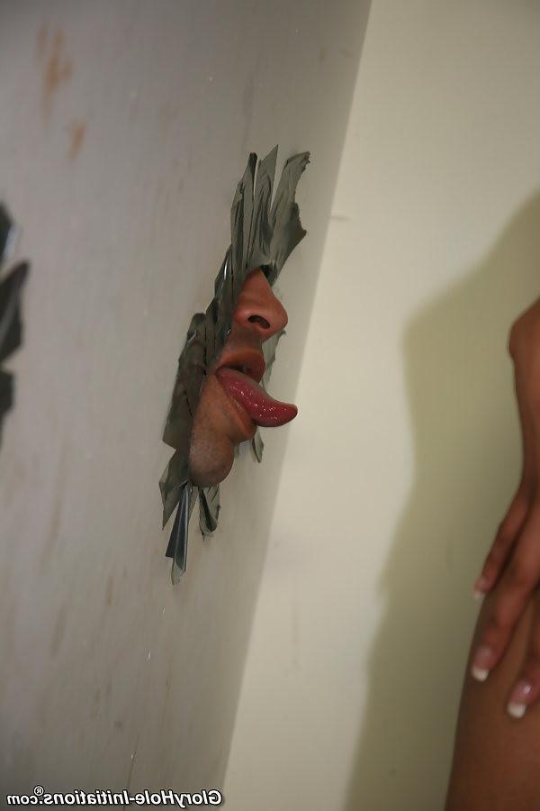 18P Big Titted London Reigns sucking off two cocks at gloryhole