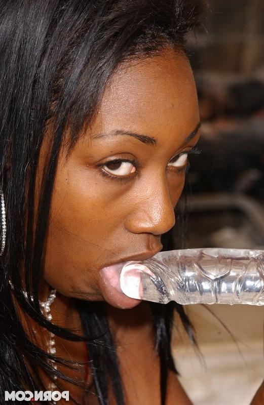 15P Black lesbian babes using a double dildo and feet to get off
