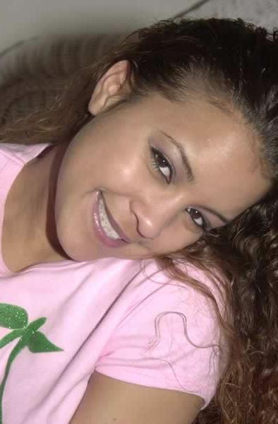 13P Cute ebony teen posing in bed