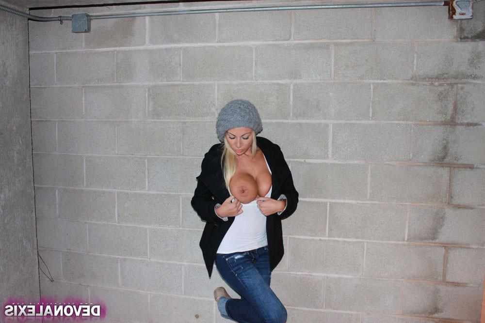 15P Devon Alexis shows her big boobs in a parking garage