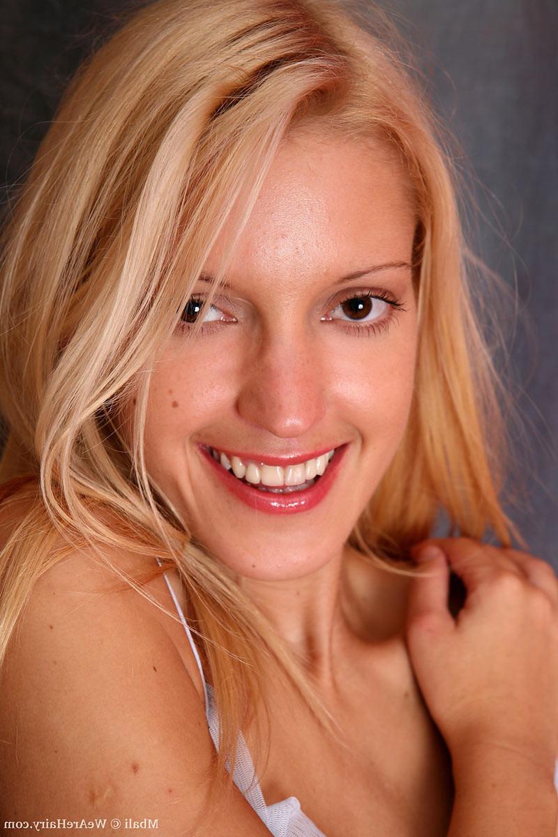 16P Gorgeous petite blonde with a hot ass fingers her hairy twat