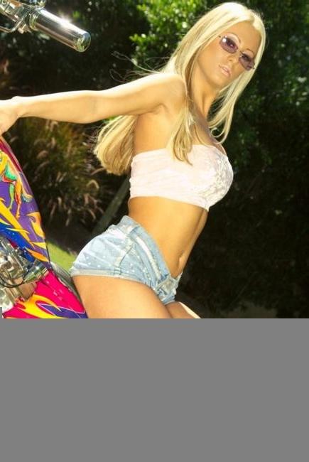 16P Krystal Steal posing on her sex machine