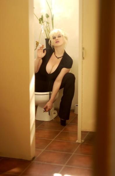 20P Smoking busty blonde