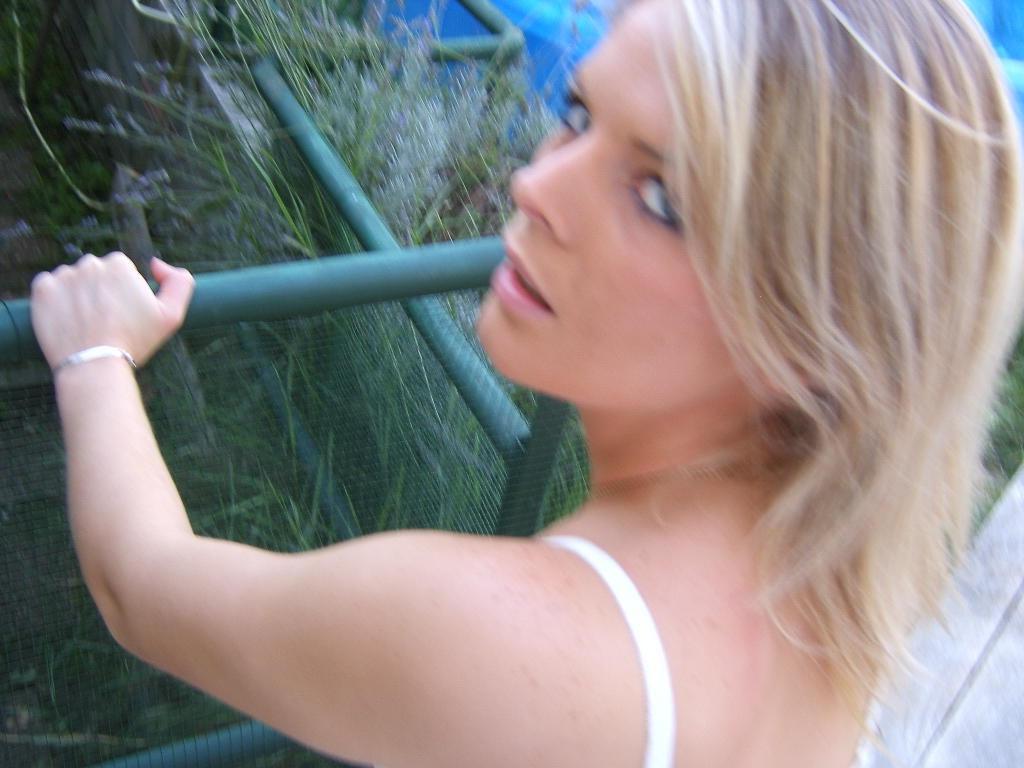 15P Blonde sucking a guy's cock in her garden