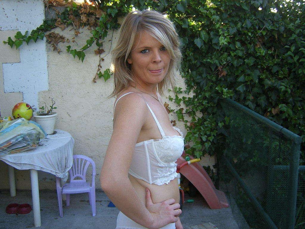 15P Blonde sucking a guy's cock in her garden