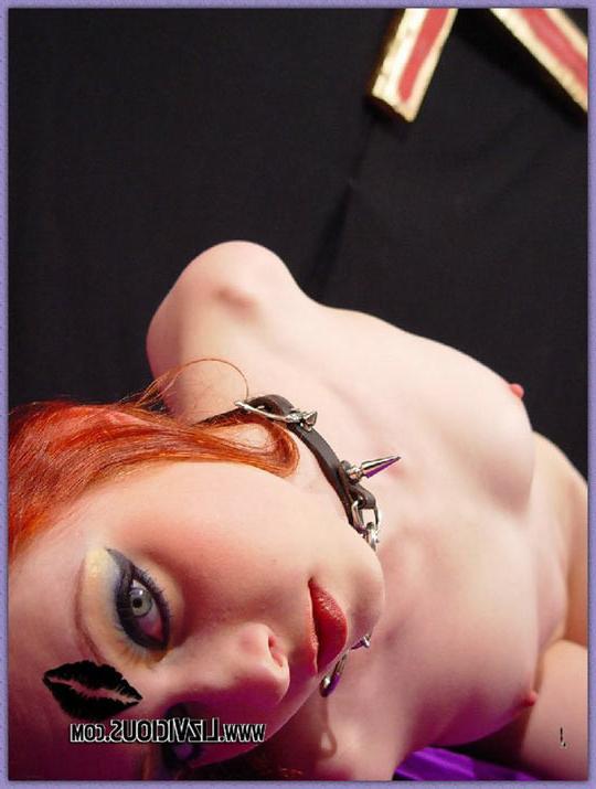 16P Naked redhead teen with cuffed legs and hands shows her shaved pussy