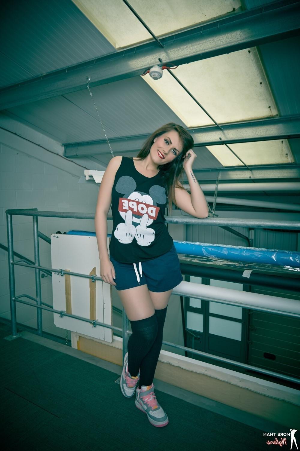 12P Beauty brunette strips to her black socks