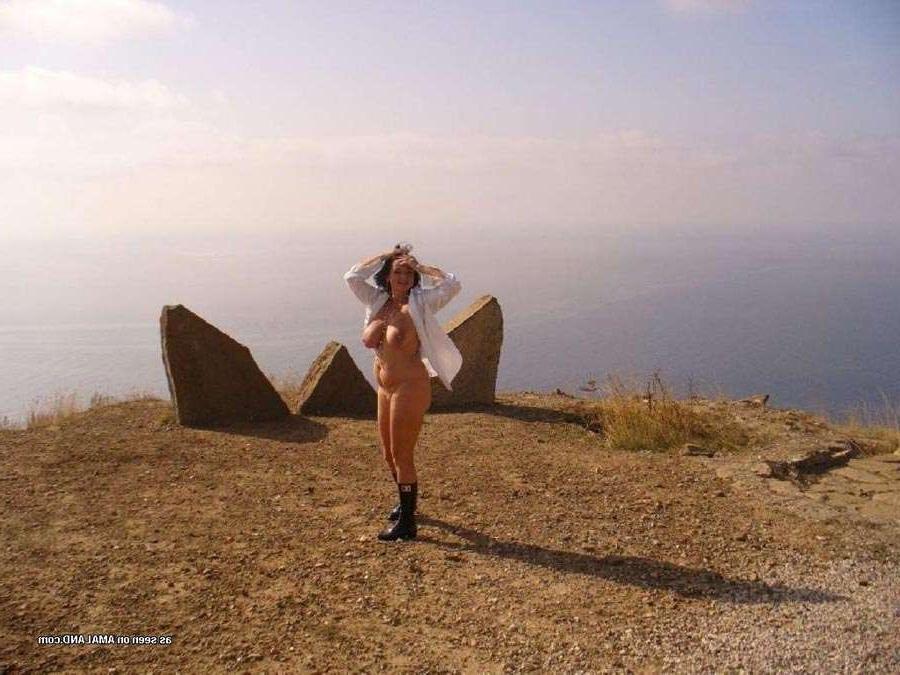 12P Showing off her massive melons outside