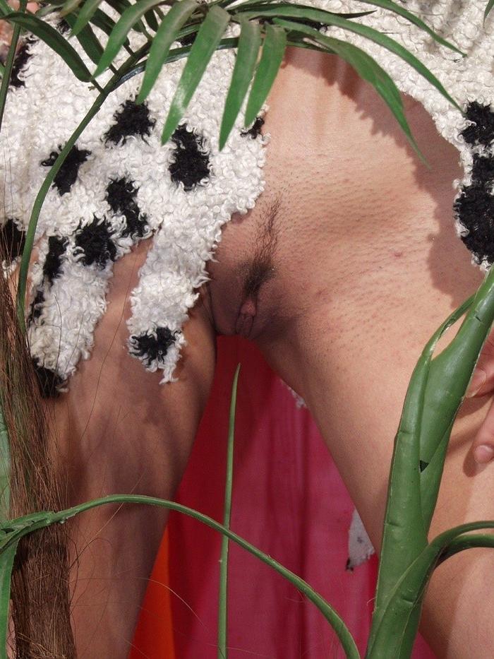 16P Cute petite teen stripping behind a palm tree
