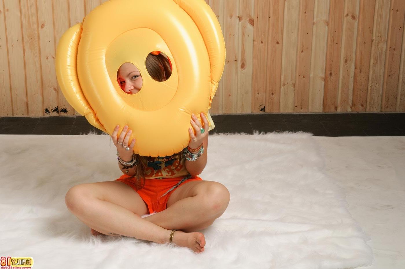16P Teen Emily plays with pool toy