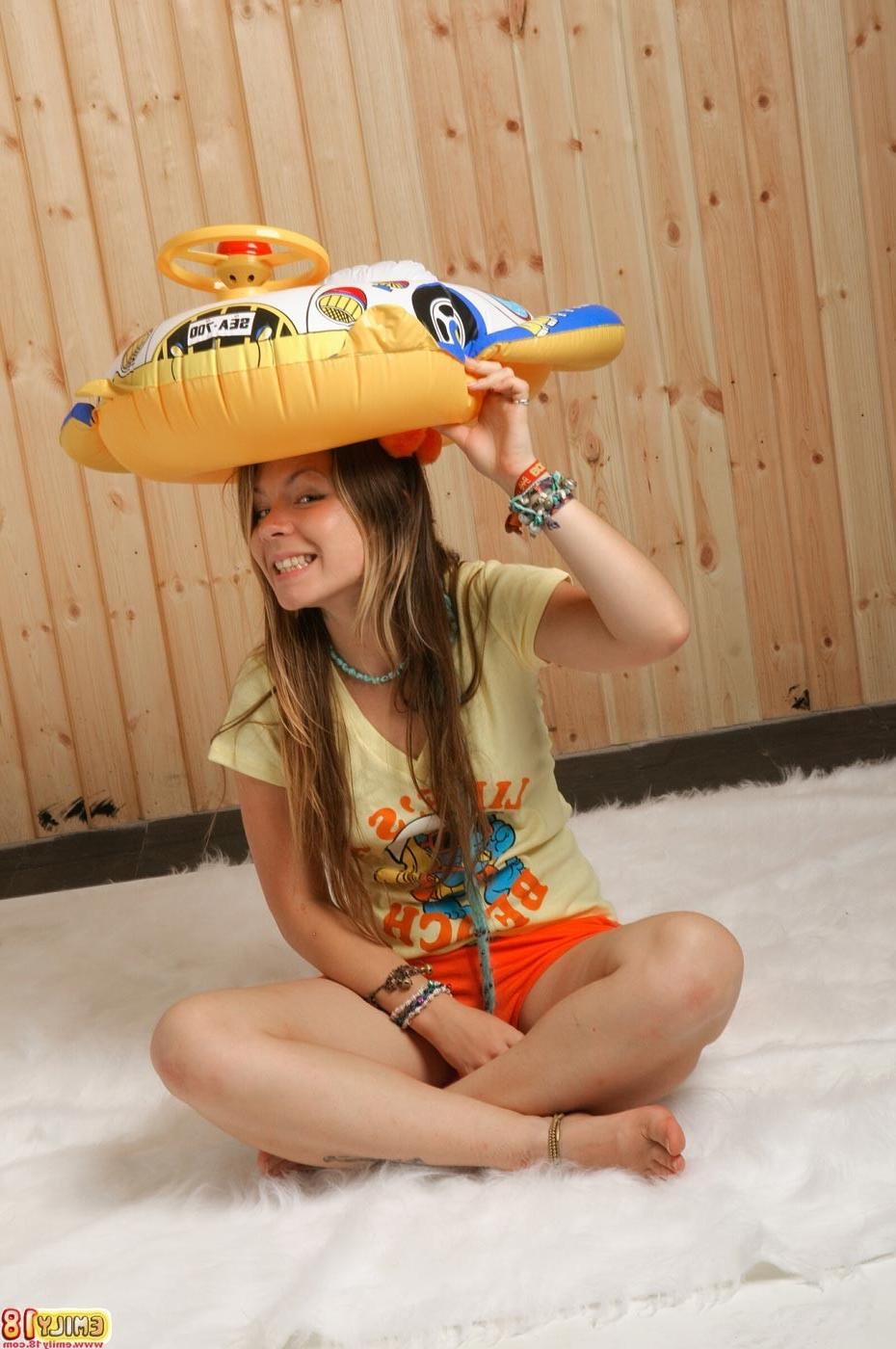 16P Teen Emily plays with pool toy