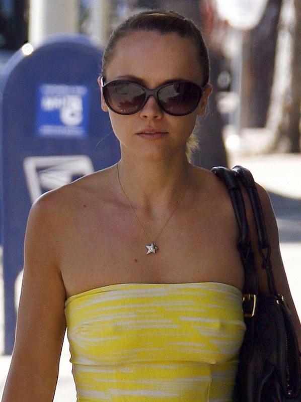16P christina ricci faunts her boobs and massive pokies