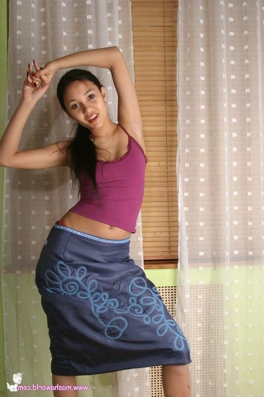 15P Petite cutie exposing her firm tits