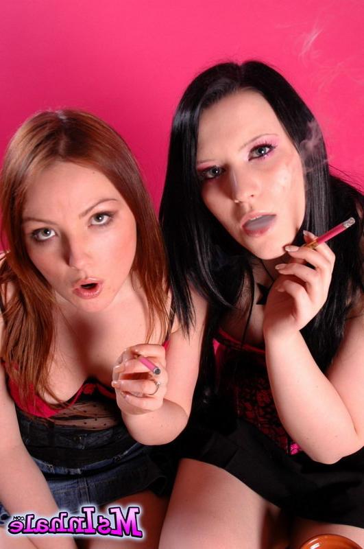 16P two teens smoking pink cigarettes