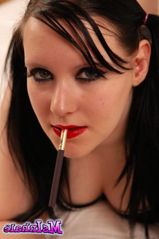 16P teen with pigtails smoking on the bed
